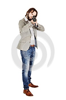 Man holding a machine gun isolated on white background