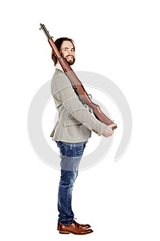 Man holding a machine gun isolated on white background