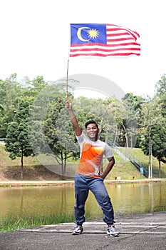 Man holding malaysia flag