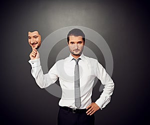 Man holding mask with good mood