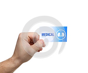 Man holding medical business card isolated on white. Nephrology service