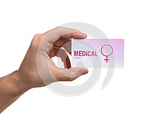 Man holding medical business card isolated on white. Women`s health service