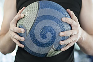 Man holding medicine ball