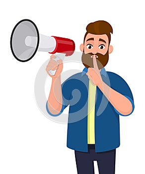 Man is holding a megaphone or loudspeaker and holding index finger on lips asking for silence. Shh! Keep quiet! Silence please!