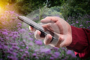 Man holding mobile smart phone