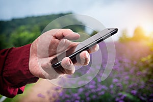 Man holding mobile smart phone