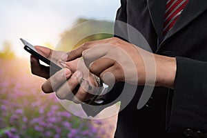 Man holding mobile smart phone