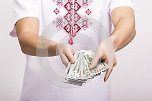 Man holding money in hand