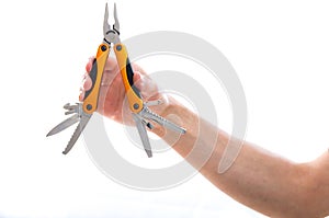 Man holding a multifunction plier and knife set