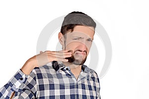 Man holding nose against bad smell.