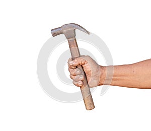 A man holding an old and rusty hammer isolated