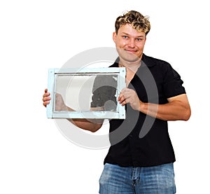 Man holding an old window