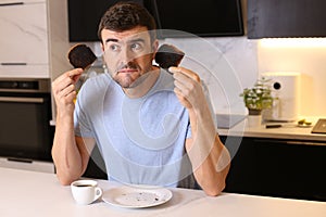 Man holding overdone toasted bread