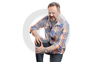 Man holding painful knee