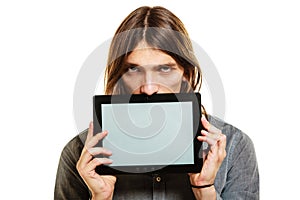Man holding pc tablet. Blank screen copyspace.