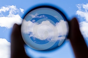 Man holding a photo polarizer filter. photo accessory increases image contrast and removes glare from the sun photo