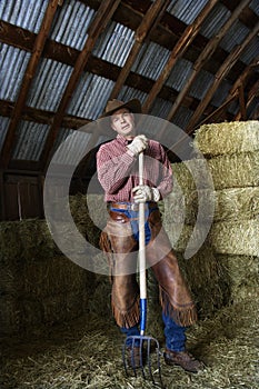 Man Holding a Pitchfork