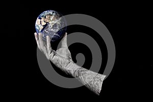 Man holding planet earth