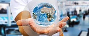 Man holding the planet earth in his hand