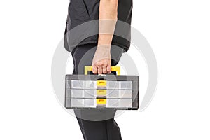 Man holding plastic tool box.