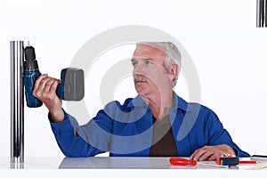 Man holding a power tool