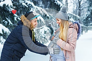 Man holding pregnant belly outdoors