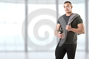 Man Holding a Protein Shake