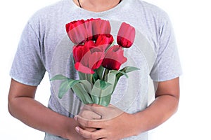 Man holding red rose flower. Valentines day and  Couples concept. Love and Flirting theme. Close up at rose. Body part and