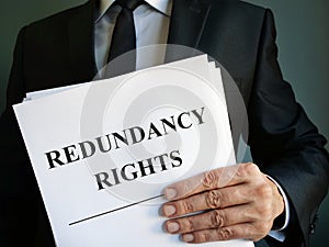 Man is holding Redundancy rights law
