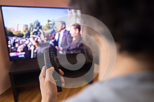 Man holding remote control