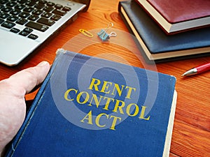 Man in holding Rent Control Act law