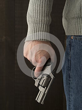 Man holding a revolver