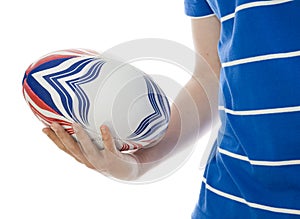 Man holding rugby ball