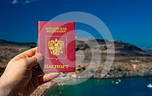 Man holding Russian passport