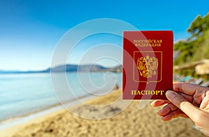 Man holding Russian passport