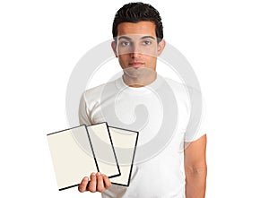 Man holding set DVD movies or games in his hand