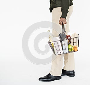 Man Holding Shopping Basket Concept photo
