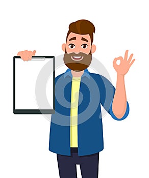 Man holding/showing a blank clipboard, report, record, document and showing okay/OK sign. Human emotion and body language concept.