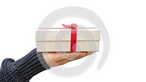 Man holding a silver gift box on a white background