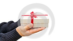 Man holding a silver gift box on a white background