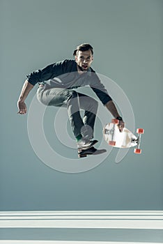 Man holding skateboard