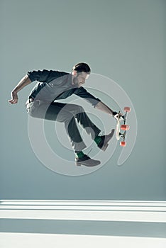 Man holding skateboard