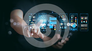 Man holding smartphone and touching virtual mobile app interface. UI UX design, software development, and digital data analysis