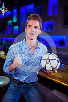 Man holding soccer ball