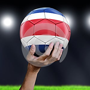 Man holding Soccer ball with Costa Rican flag