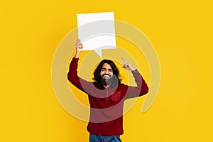 Man Holding Speech Bubble Above His Head