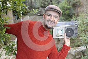 Man holding stereo boombox in the 1980s