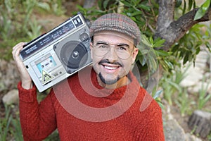 Man holding stereo boombox in the 1980s