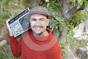 Man holding stereo boombox in the 1980s