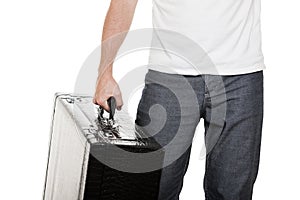 Man holding suitcase in hand